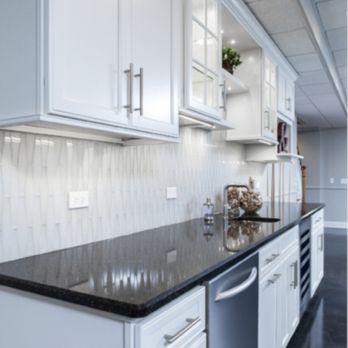 Bright walk‑in shower with marble surround