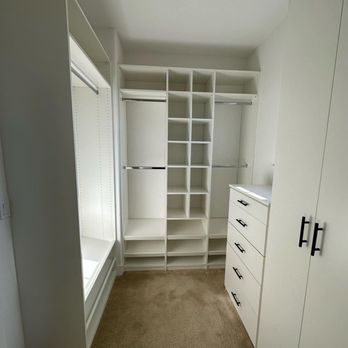 Custom closet build‑out with shelving & drawers